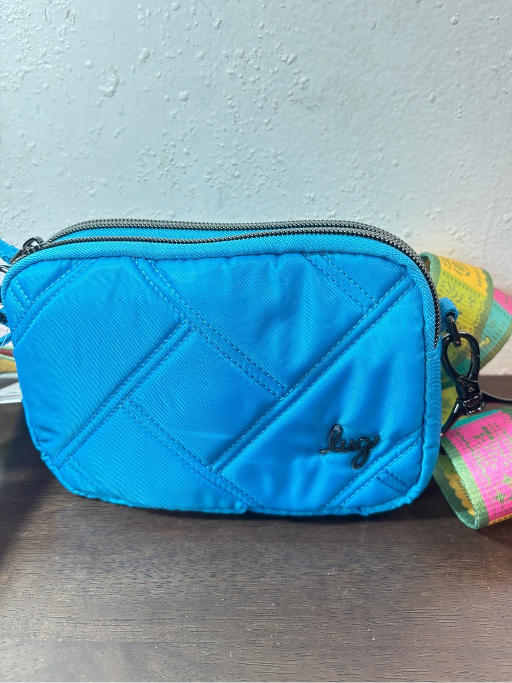 lug Quilted Teal Crossbody with Multicolor Woven Strap - Picture 8 of 8
